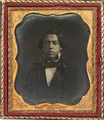 (PHOTOGRAPHY--EARLY AND CASED IMAGES.) Seated young man (supplied title).